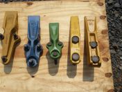 Zęby przykręcane do chwytaków.